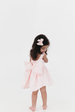 Girls bow back perfect in pink mini dress