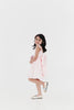 Girls bow back perfect in pink mini dress