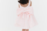 Girls bow back perfect in pink mini dress