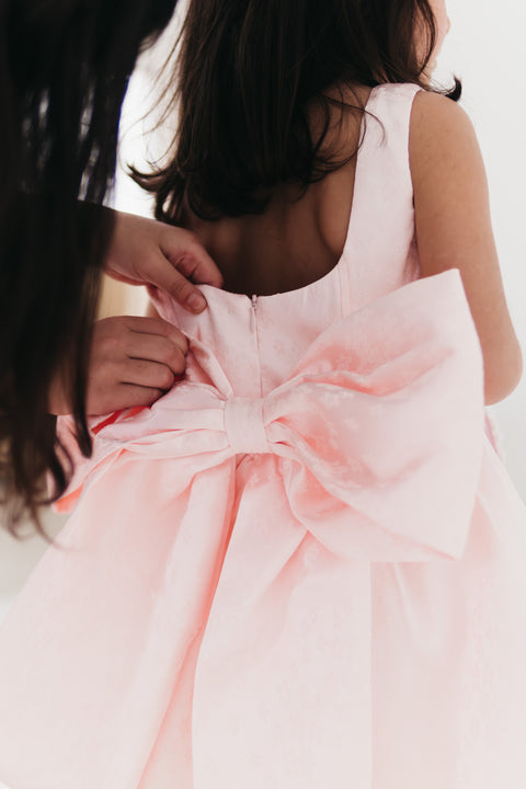 Girls bow back perfect in pink mini dress