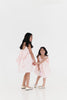Girls bow back perfect in pink mini dress