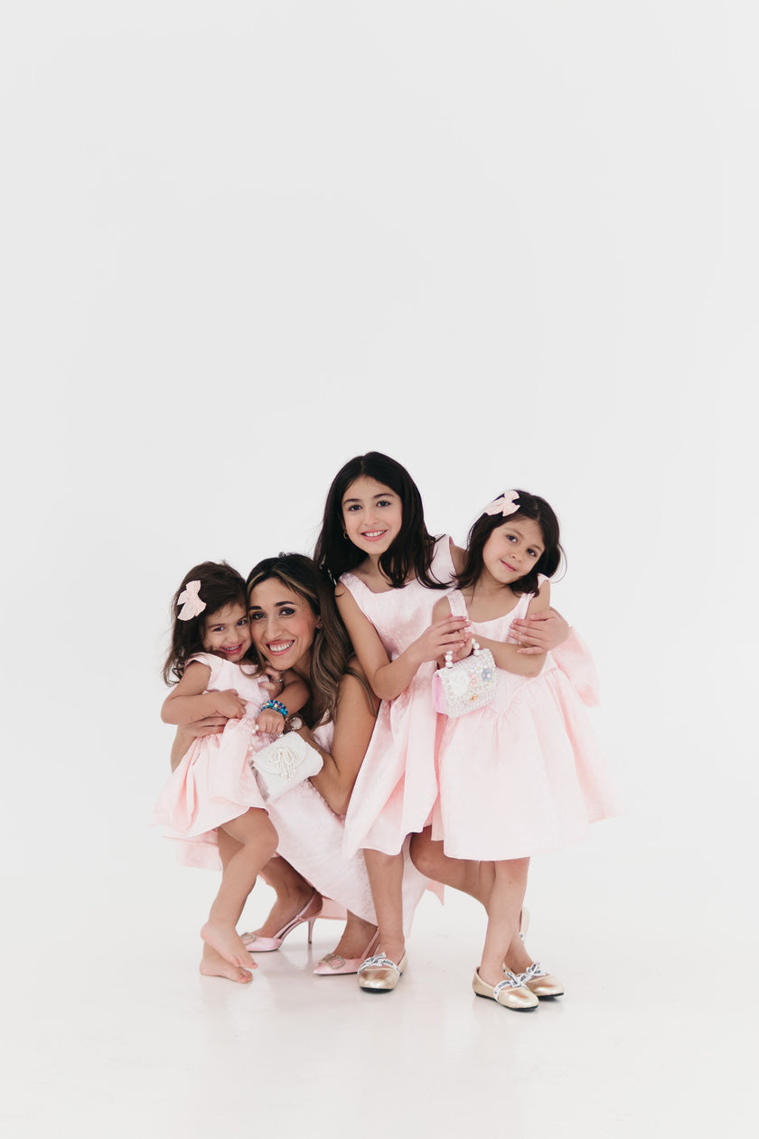 Girls bow back perfect in pink mini dress